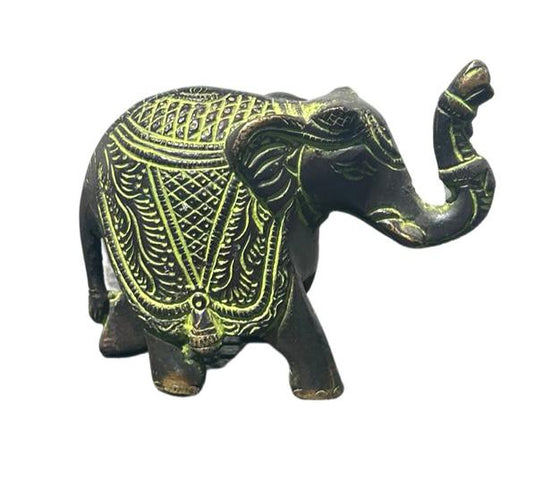 [[Small brass elephant statue///Petite statue d'éléphant en laiton]]
