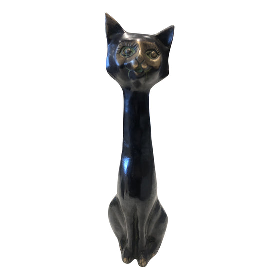 [[Brass cat statue///Statue de chat en laiton]]