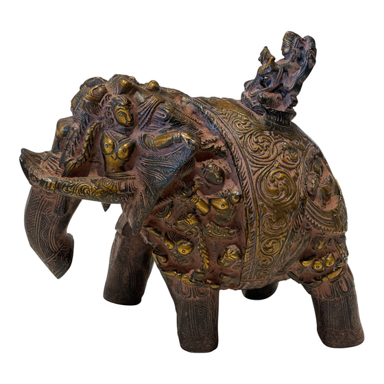 [[Decorative brass elephant with vintage red patina///Éléphant décoratif en laiton avec patine rouge vintage]]