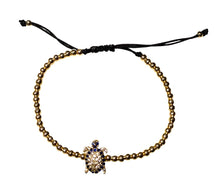  [[Turtle protection bracelet///Bracelet de protection tortue]]