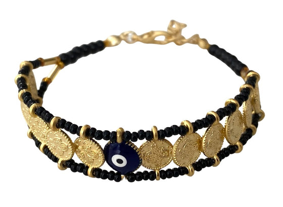 [[Evil eye coin bracelet///Bracelet de pièces de monnaie avec le mauvais œil]]