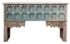 [[Jodhpur blue console table with an old Indian door facade///Table console bleue de Jodhpur avec une vieille façade de porte indienne]]