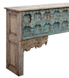 [[Jodhpur blue console table with an old Indian door facade///Table console bleue de Jodhpur avec une vieille façade de porte indienne]]