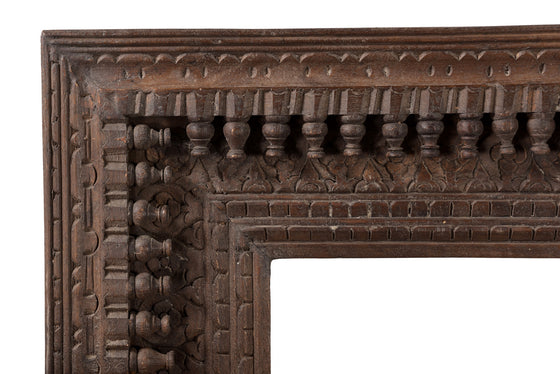 [[Reclaimed wood mirror frame with detailed carvings//Cadre de miroir en bois récupéré avec des sculptures détaillées]]