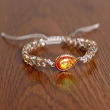  [[Hand braided orange crystal bracelet///Bracelet tressé à la main en crystal orange]]