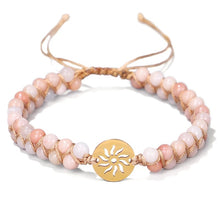 [[Hand braided rose quartz bracelet with a sunflower charm///Bracelet en quartz rose tressé à la main avec une breloque tournesol]]