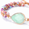 [[Hand braided jasper bracelet with an amazonite charm///Bracelet en jaspe tressé à la main avec une breloque en amazonite]]