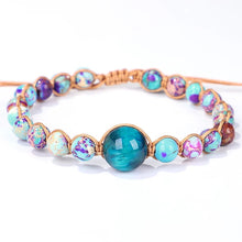  [[Hand braided jasper bracelet with a turquoise tiger's eye charm///Bracelet en jaspe tressé à la main avec une breloque œil de tigre en turquoise]]