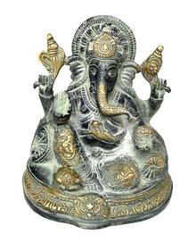  [[Brass ganesh statue///Statue de Ganesh en laiton]]