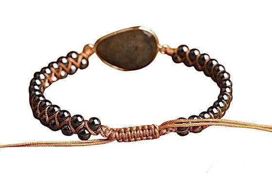 [[Hand braided labradorite and iron stone bracelet///Bracelet en pierre de fer et labradorite tressé à la main]]