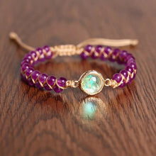  [[Hand braided amethyst bracelet with an opal charm///Bracelet tressé à la main en améthyste avec une breloque d'opale]]