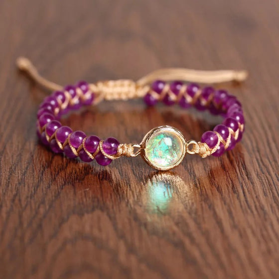 [[Hand braided amethyst bracelet with an opal charm///Bracelet tressé à la main en améthyste avec une breloque d'opale]]