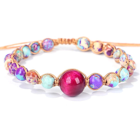 [[Hand braided jasper bracelet with a pink tiger's eye charm///Bracelet en jaspe tressé à la main avec une breloque œil de tigre rose]]
